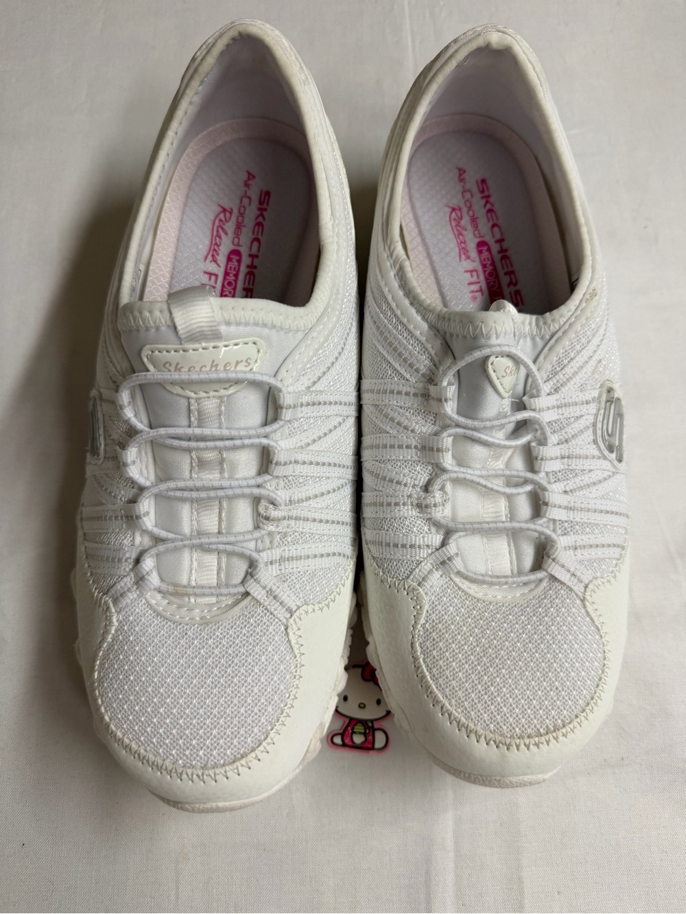 Skechers Women's White Slip-On Athletic Sneakers with Elastic Bungee